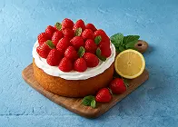 Raspberry and strawberry cake with syrup and chocolate