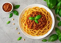 Spaghetti bolognese pasta with tomatoes and a creamy sauce